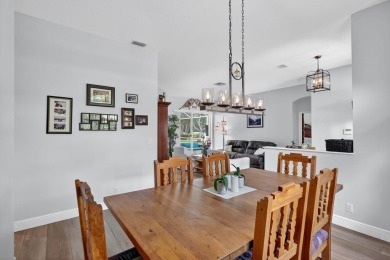 This is the ONE! Elegant and spacious, this 4 bedroom, 3 full on Hammock Creek Golf Club in Florida - for sale on GolfHomes.com, golf home, golf lot