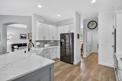 This is the ONE! Elegant and spacious, this 4 bedroom, 3 full on Hammock Creek Golf Club in Florida - for sale on GolfHomes.com, golf home, golf lot