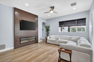 This is the ONE! Elegant and spacious, this 4 bedroom, 3 full on Hammock Creek Golf Club in Florida - for sale on GolfHomes.com, golf home, golf lot