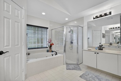 This is the ONE! Elegant and spacious, this 4 bedroom, 3 full on Hammock Creek Golf Club in Florida - for sale on GolfHomes.com, golf home, golf lot