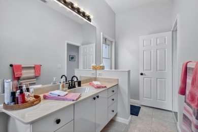 This is the ONE! Elegant and spacious, this 4 bedroom, 3 full on Hammock Creek Golf Club in Florida - for sale on GolfHomes.com, golf home, golf lot