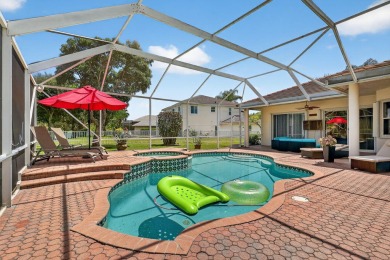 This is the ONE! Elegant and spacious, this 4 bedroom, 3 full on Hammock Creek Golf Club in Florida - for sale on GolfHomes.com, golf home, golf lot