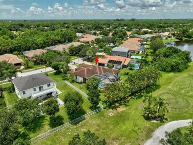 This is the ONE! Elegant and spacious, this 4 bedroom, 3 full on Hammock Creek Golf Club in Florida - for sale on GolfHomes.com, golf home, golf lot