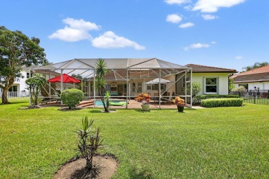 This is the ONE! Elegant and spacious, this 4 bedroom, 3 full on Hammock Creek Golf Club in Florida - for sale on GolfHomes.com, golf home, golf lot