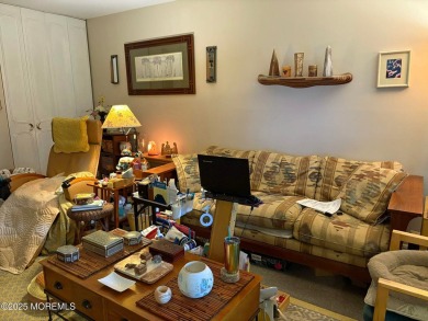A Greenbriar model where access to the front door entrance is on Greenbriar Woodlands in New Jersey - for sale on GolfHomes.com, golf home, golf lot