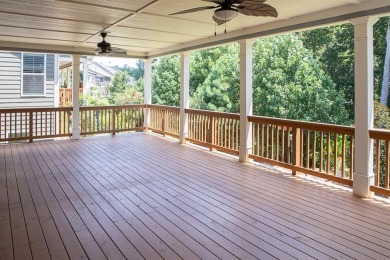 Tucked away on a wooded lot in Cresswind at Lake Lanier, a on Lanier Island Legacy Golf Couorse in Georgia - for sale on GolfHomes.com, golf home, golf lot