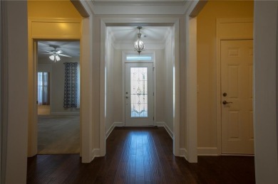 Tucked away on a wooded lot in Cresswind at Lake Lanier, a on Lanier Island Legacy Golf Couorse in Georgia - for sale on GolfHomes.com, golf home, golf lot