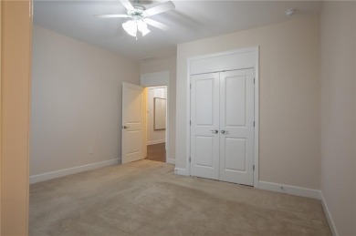 Tucked away on a wooded lot in Cresswind at Lake Lanier, a on Lanier Island Legacy Golf Couorse in Georgia - for sale on GolfHomes.com, golf home, golf lot
