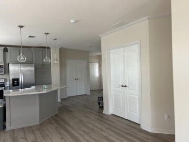 TWO YEAR OLD CONSTRUCTION! TAKE A LOOK AT THIS 2022 MODEL WITH on The Links of Lake Bernadette in Florida - for sale on GolfHomes.com, golf home, golf lot