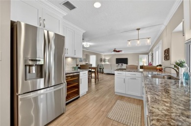 Welcome to this beautifully maintained 3 bedroom, 2 bath home on Yacht and Country Club in Florida - for sale on GolfHomes.com, golf home, golf lot