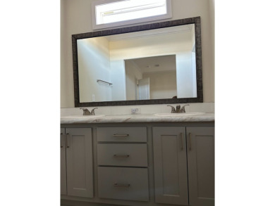 TWO YEAR OLD CONSTRUCTION! TAKE A LOOK AT THIS 2022 MODEL WITH on The Links of Lake Bernadette in Florida - for sale on GolfHomes.com, golf home, golf lot