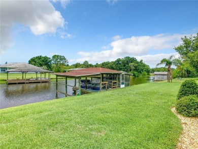 Under contract-accepting backup offers. WATERFRONT HOME on one on Indian Lake Estates Golf and Country Club in Florida - for sale on GolfHomes.com, golf home, golf lot