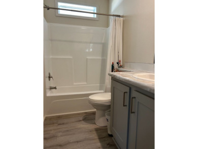 TWO YEAR OLD CONSTRUCTION! TAKE A LOOK AT THIS 2022 MODEL WITH on The Links of Lake Bernadette in Florida - for sale on GolfHomes.com, golf home, golf lot