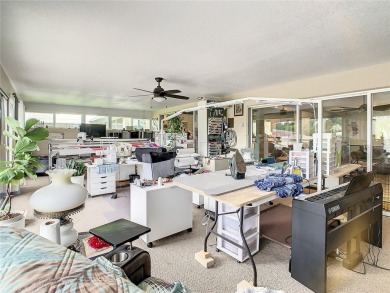 Under contract-accepting backup offers. WATERFRONT HOME on one on Indian Lake Estates Golf and Country Club in Florida - for sale on GolfHomes.com, golf home, golf lot