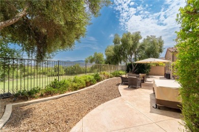 Welcome to effortless luxury in one of Corona's most exclusive on Glen Ivy Golf Club in California - for sale on GolfHomes.com, golf home, golf lot