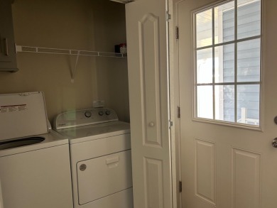 TWO YEAR OLD CONSTRUCTION! TAKE A LOOK AT THIS 2022 MODEL WITH on The Links of Lake Bernadette in Florida - for sale on GolfHomes.com, golf home, golf lot