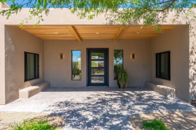 This newly constructed home combines Southwestern contemporary on Desert Highlands Golf Club in Arizona - for sale on GolfHomes.com, golf home, golf lot