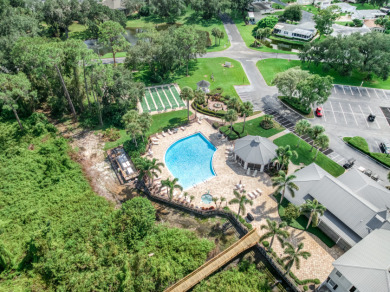 BEAUTIFUL, SERENE WATER SETTING & GOLF COURSE VIEWS! on Highlands Ridge Golf Course - South in Florida - for sale on GolfHomes.com, golf home, golf lot