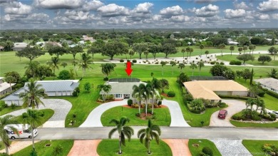 Welcome to this beautifully maintained 3 bedroom, 2 bath home on Yacht and Country Club in Florida - for sale on GolfHomes.com, golf home, golf lot