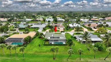 Welcome to this beautifully maintained 3 bedroom, 2 bath home on Yacht and Country Club in Florida - for sale on GolfHomes.com, golf home, golf lot