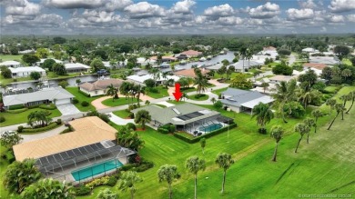 Welcome to this beautifully maintained 3 bedroom, 2 bath home on Yacht and Country Club in Florida - for sale on GolfHomes.com, golf home, golf lot