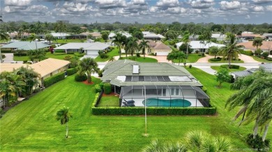 Welcome to this beautifully maintained 3 bedroom, 2 bath home on Yacht and Country Club in Florida - for sale on GolfHomes.com, golf home, golf lot