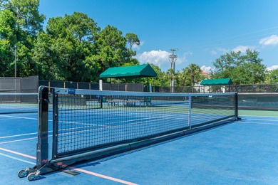 Step into serenity at 2495 Bungalo Lane, where coastal charm and on Sandestin Golf and Beach Resort - Raven in Florida - for sale on GolfHomes.com, golf home, golf lot