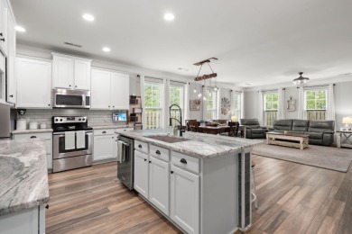 This stunning two-story home combines timeless Lowcountry charm on Cypress Point Par 3 in South Carolina - for sale on GolfHomes.com, golf home, golf lot