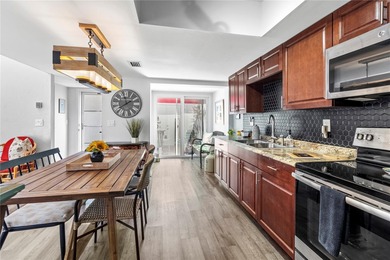 Updated 2-Bedroom, 2-Bath Villa in El Conquistador Village on IMG Academies Golf and Country Club in Florida - for sale on GolfHomes.com, golf home, golf lot