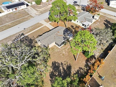 One or more photo(s) has been virtually staged. Move right into on Oak Hills Country Club in Florida - for sale on GolfHomes.com, golf home, golf lot