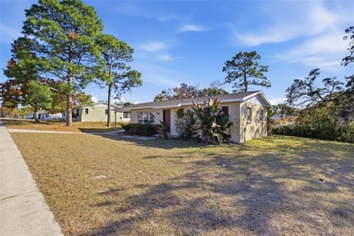 One or more photo(s) has been virtually staged. Move right into on Oak Hills Country Club in Florida - for sale on GolfHomes.com, golf home, golf lot