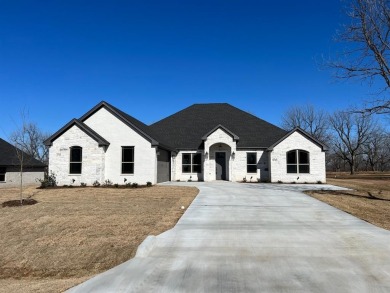 Gorgeous new home in the newest part of Pecan Plantation!  This on Nutcracker Golf Club in Texas - for sale on GolfHomes.com, golf home, golf lot