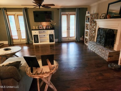 Take a look at this beautiful home located at the end of a on Diamondhead Country Club in Mississippi - for sale on GolfHomes.com, golf home, golf lot