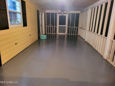 Take a look at this beautiful home located at the end of a on Diamondhead Country Club in Mississippi - for sale on GolfHomes.com, golf home, golf lot