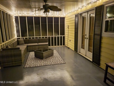 Take a look at this beautiful home located at the end of a on Diamondhead Country Club in Mississippi - for sale on GolfHomes.com, golf home, golf lot