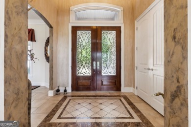 Enjoy serene views of the marsh and the golf course in this on The Club At Osprey Cove in Georgia - for sale on GolfHomes.com, golf home, golf lot