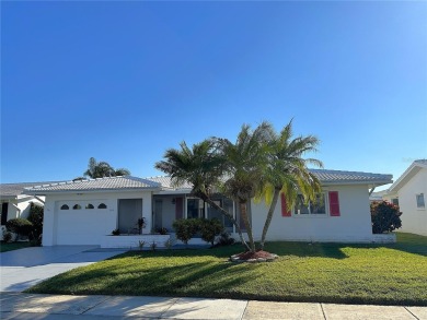 Nestled in the heart of The Mainlands, this stunning dream home on Mainlands Golf Club in Florida - for sale on GolfHomes.com, golf home, golf lot