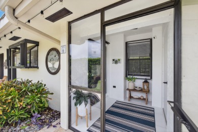 This beautifully renovated corner unit Villa has it all! on The Golf Club of Jupiter in Florida - for sale on GolfHomes.com, golf home, golf lot