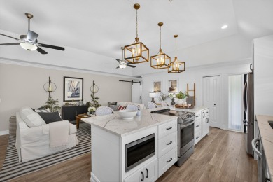 This beautifully renovated corner unit Villa has it all! on The Golf Club of Jupiter in Florida - for sale on GolfHomes.com, golf home, golf lot