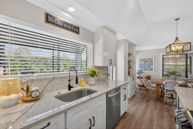 This beautifully renovated corner unit Villa has it all! on The Golf Club of Jupiter in Florida - for sale on GolfHomes.com, golf home, golf lot