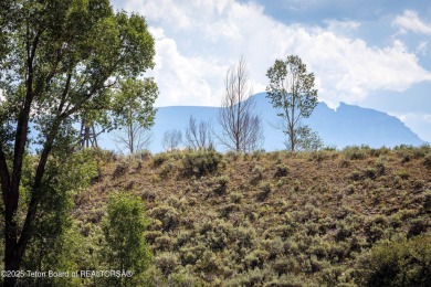 Enjoy the Tetons and Sleeping Indian as you drive onto the on Jackson Hole Golf and Tennis Club in Wyoming - for sale on GolfHomes.com, golf home, golf lot