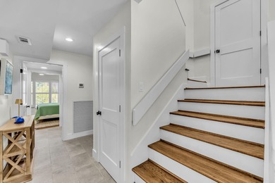 A thoughtfully renovated two-level villa with elevated living on The Seabrook Island Club in South Carolina - for sale on GolfHomes.com, golf home, golf lot