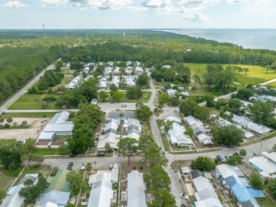 This charming one-bedroom, one-bathroom townhouse offers the on St. James Bay in Florida - for sale on GolfHomes.com, golf home, golf lot