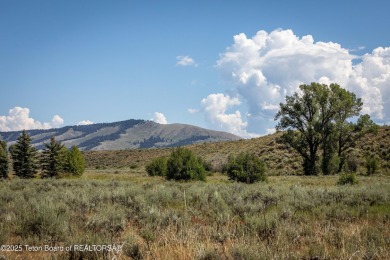 Enjoy the Tetons and Sleeping Indian as you drive onto the on Jackson Hole Golf and Tennis Club in Wyoming - for sale on GolfHomes.com, golf home, golf lot