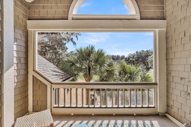 A thoughtfully renovated two-level villa with elevated living on The Seabrook Island Club in South Carolina - for sale on GolfHomes.com, golf home, golf lot