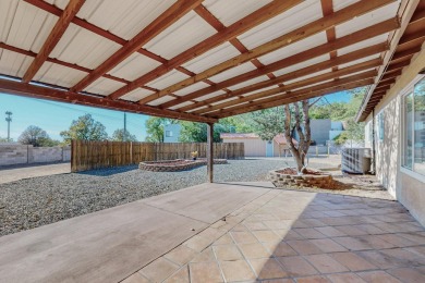 This Fantastic home offers an open concept floorplan on a rare on Arroyo Del Oso Golf Course in New Mexico - for sale on GolfHomes.com, golf home, golf lot