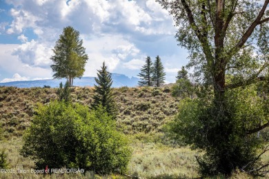 Enjoy the Tetons and Sleeping Indian as you drive onto the on Jackson Hole Golf and Tennis Club in Wyoming - for sale on GolfHomes.com, golf home, golf lot