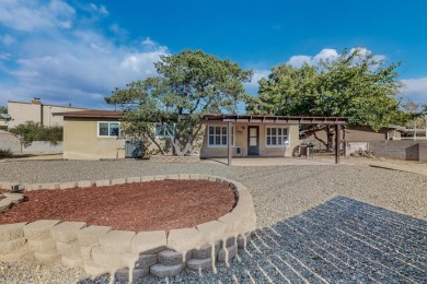 This Fantastic home offers an open concept floorplan on a rare on Arroyo Del Oso Golf Course in New Mexico - for sale on GolfHomes.com, golf home, golf lot