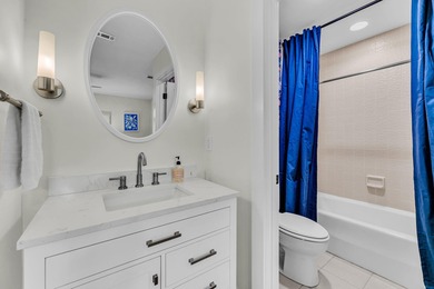 A thoughtfully renovated two-level villa with elevated living on The Seabrook Island Club in South Carolina - for sale on GolfHomes.com, golf home, golf lot