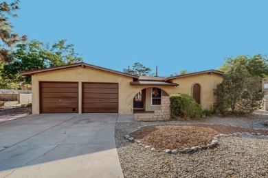 This Fantastic home offers an open concept floorplan on a rare on Arroyo Del Oso Golf Course in New Mexico - for sale on GolfHomes.com, golf home, golf lot